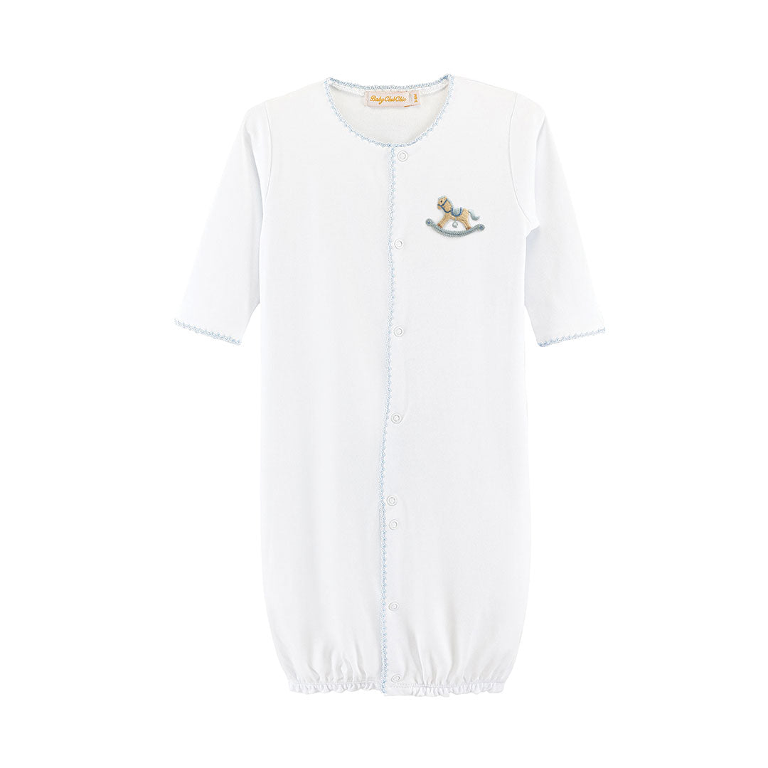 Blue trimmed white baby converter with small embroidered rocking horse on chest. 
