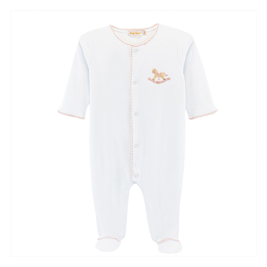 Pink trimmed white footie with rocking horse design embroidered on chest