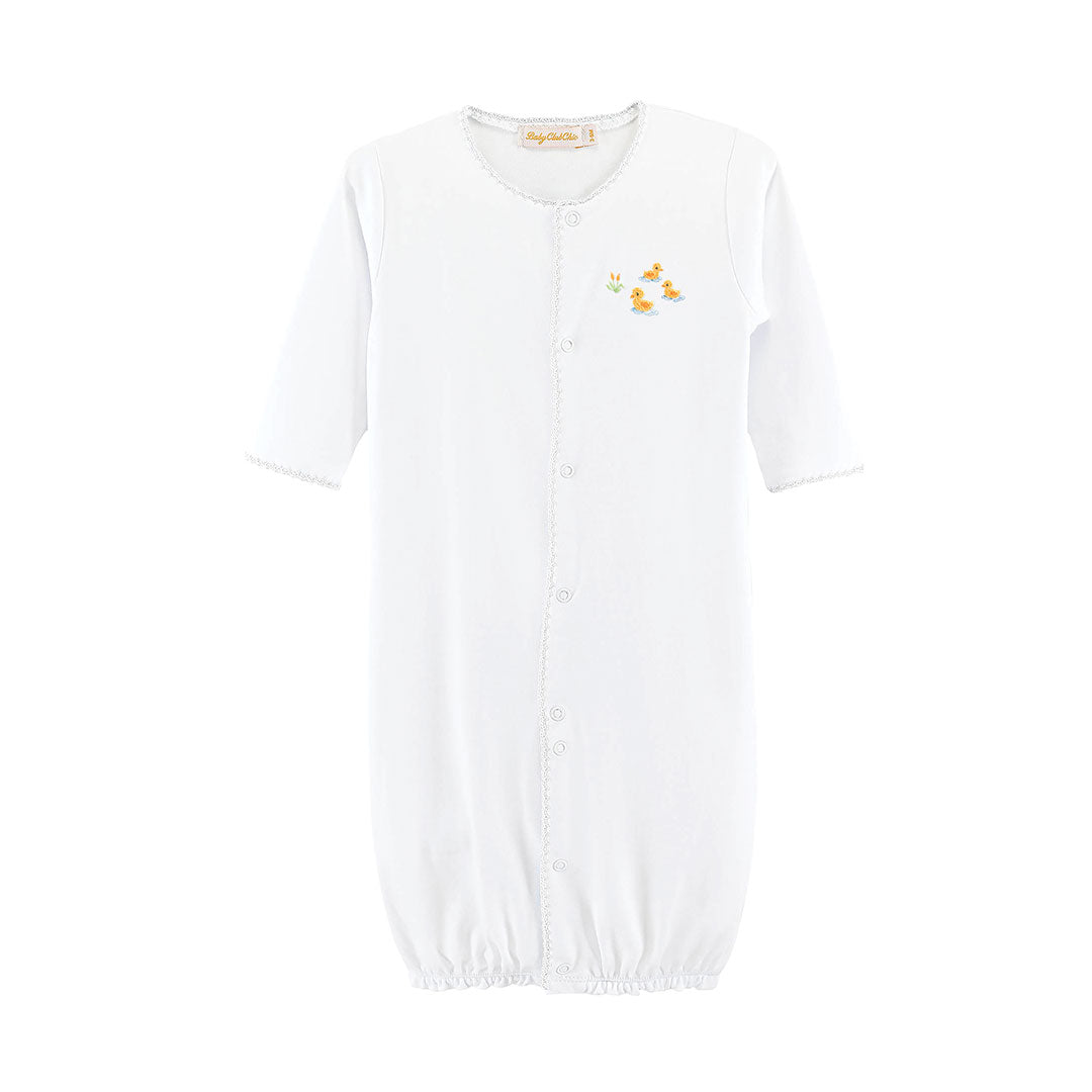 White converter gown with three yellow ducks embroidered on chest  