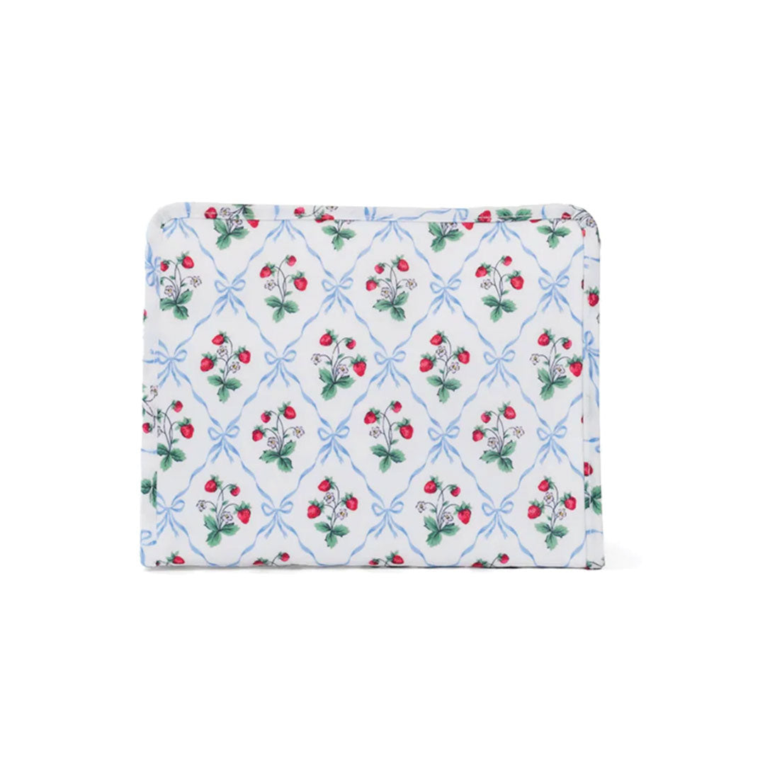 Travel pouch with berry fruit themed illustrations on a white background.