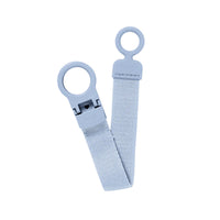 Light blue baby pacifier with a clip on a white background.