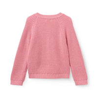 Back of a pink knitted cardigan sweater with buttons down the front on a white background.