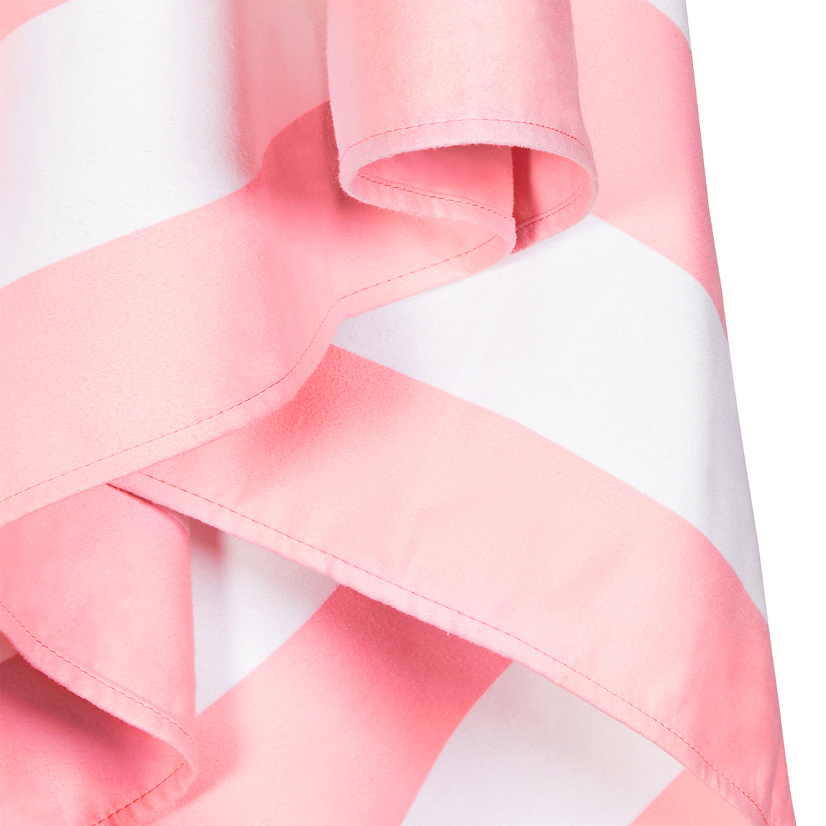 Close-up of a pink and white checkered beach towel on white background.