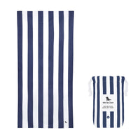 Navy and white striped beach towel with a smaller striped bag on a white background.
