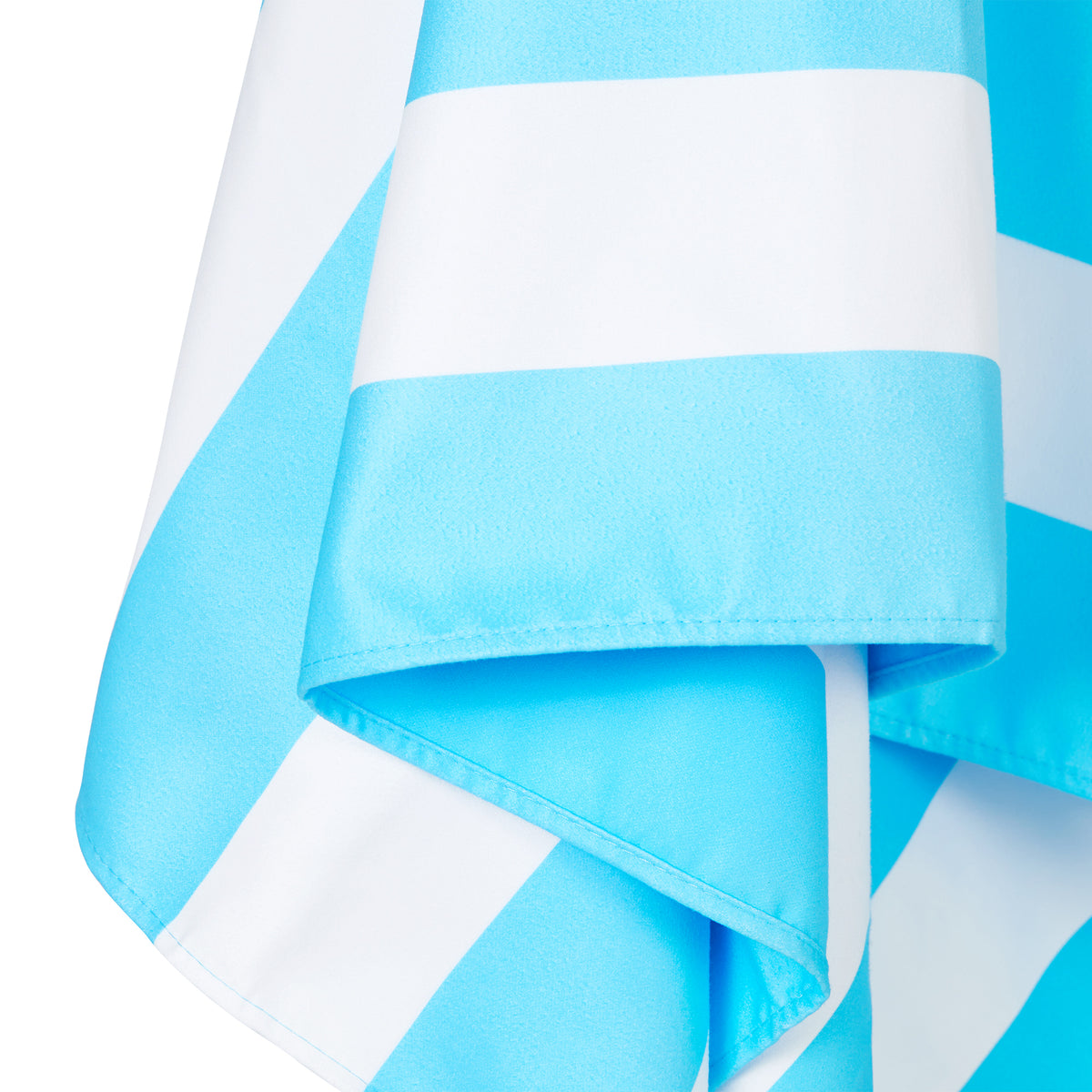 Close-up of a blue and white striped beach towel on a white background.