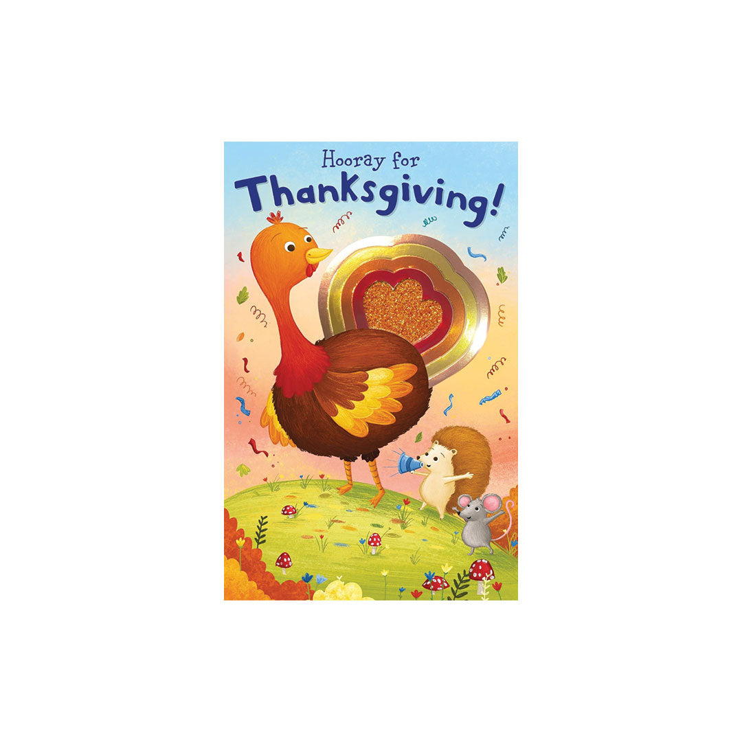 A colorful children's book cover titled 'Hooray for Thanksgiving!' featuring an illustrated turkey, a small mouse, and autumn-themed decorations on a grassy hill.