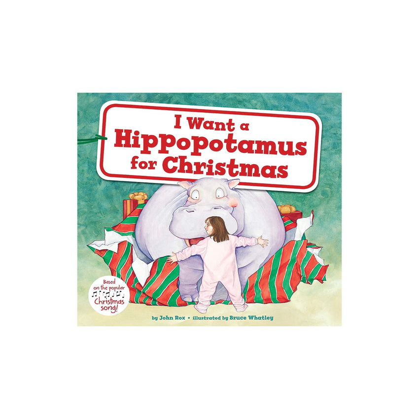 Children's book cover titled "I Want a Hippopotamus for Christmas" showing a cartoon hippopotamus wrapped in red and green striped Christmas paper, with a child in pink pajamas standing beside it. The cover is centered on a white background.
