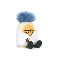 Toy stuffed egg with blue hair, yellow face, and white lab coat on a white background.