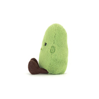 Side view of a plush edamame bean toy on a white background.