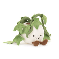 Plush toy shaped like an ivy plant in a white pot a white background.