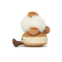 A plush toy shaped like a cream puff, shown from the side on a clean white background. The toy has a fluffy white top section, tan and cream horizontal striped body, and a brown feet.