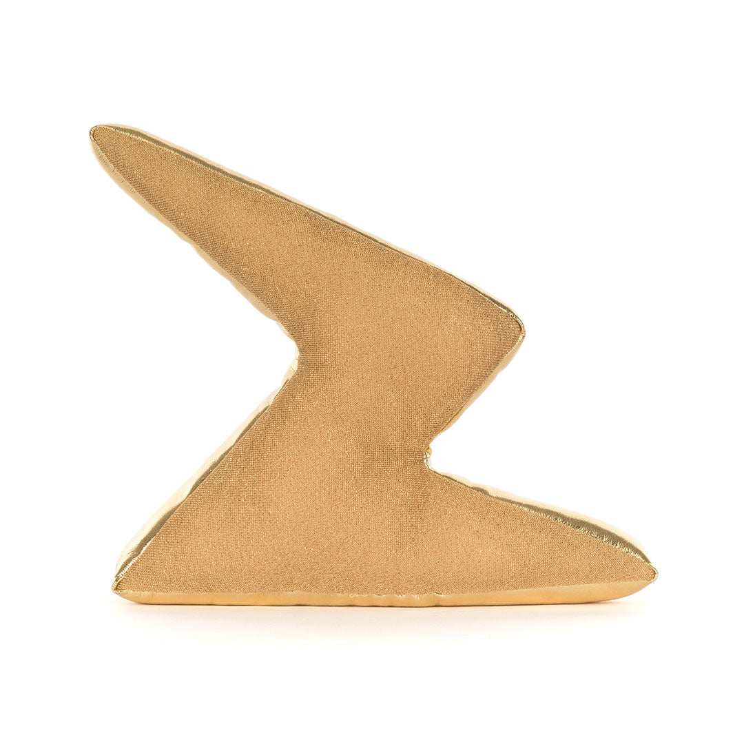 A bolt of lightening stuffed toy shown on a  white background.