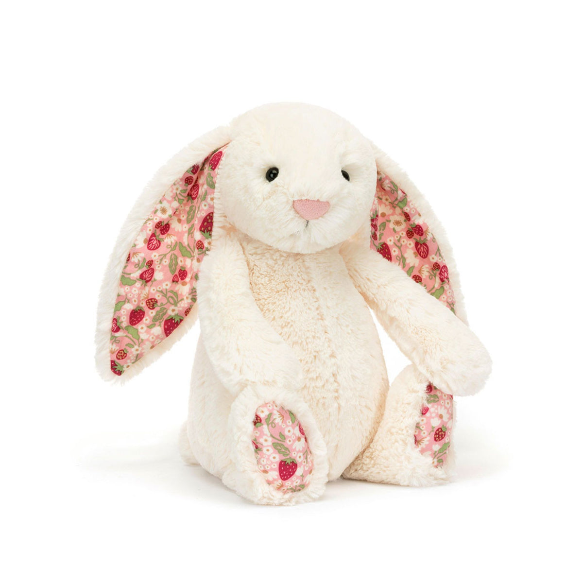 A plush bunny toy in cream-colored fabric with long floppy ears and pink floral-patterned inner ears, shown on a clean white background.