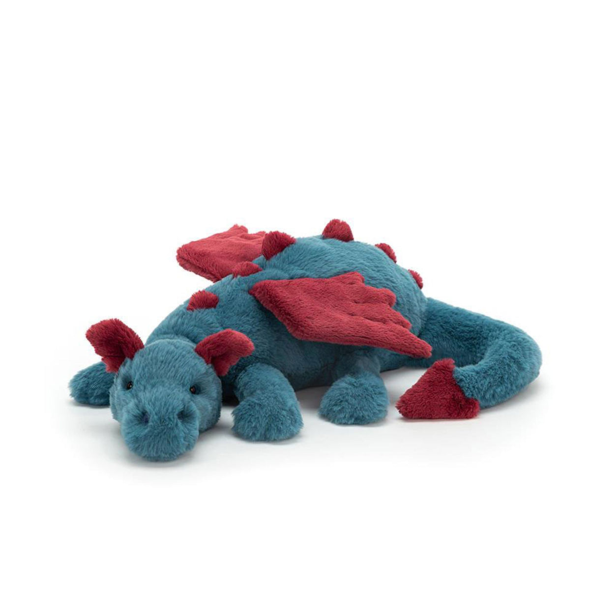 Front facing view of a blue dragon with red wings, ears and scales stuffed animal on a white background.