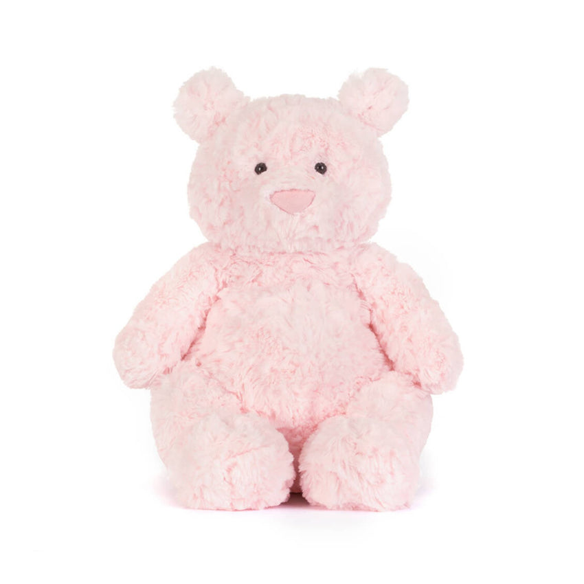 Pink stuffed bear plush toy on a white background