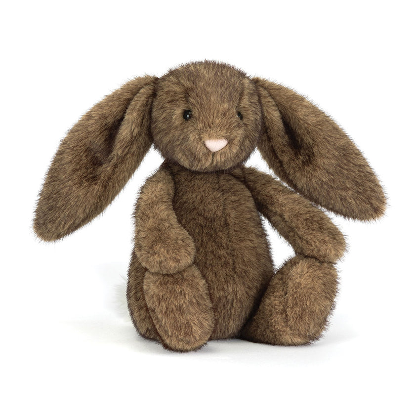 Brown plush bunny toy on a white background.