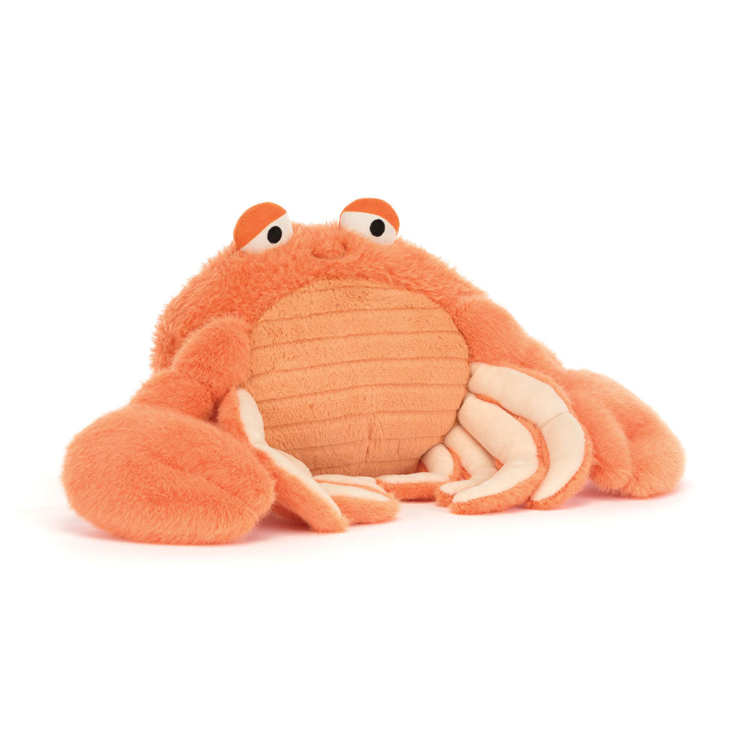 An orange plush stuffed crab toy with cream-colored claws and eyes, photographed on a clean white background.