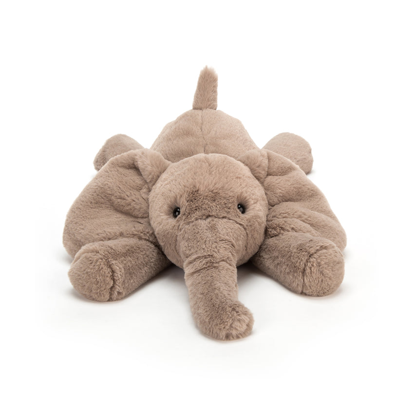 Soft fabric elephant plush toy on a white background.