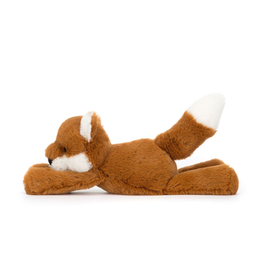 An orange and white fox stuffed animal plush laying down on a white background.