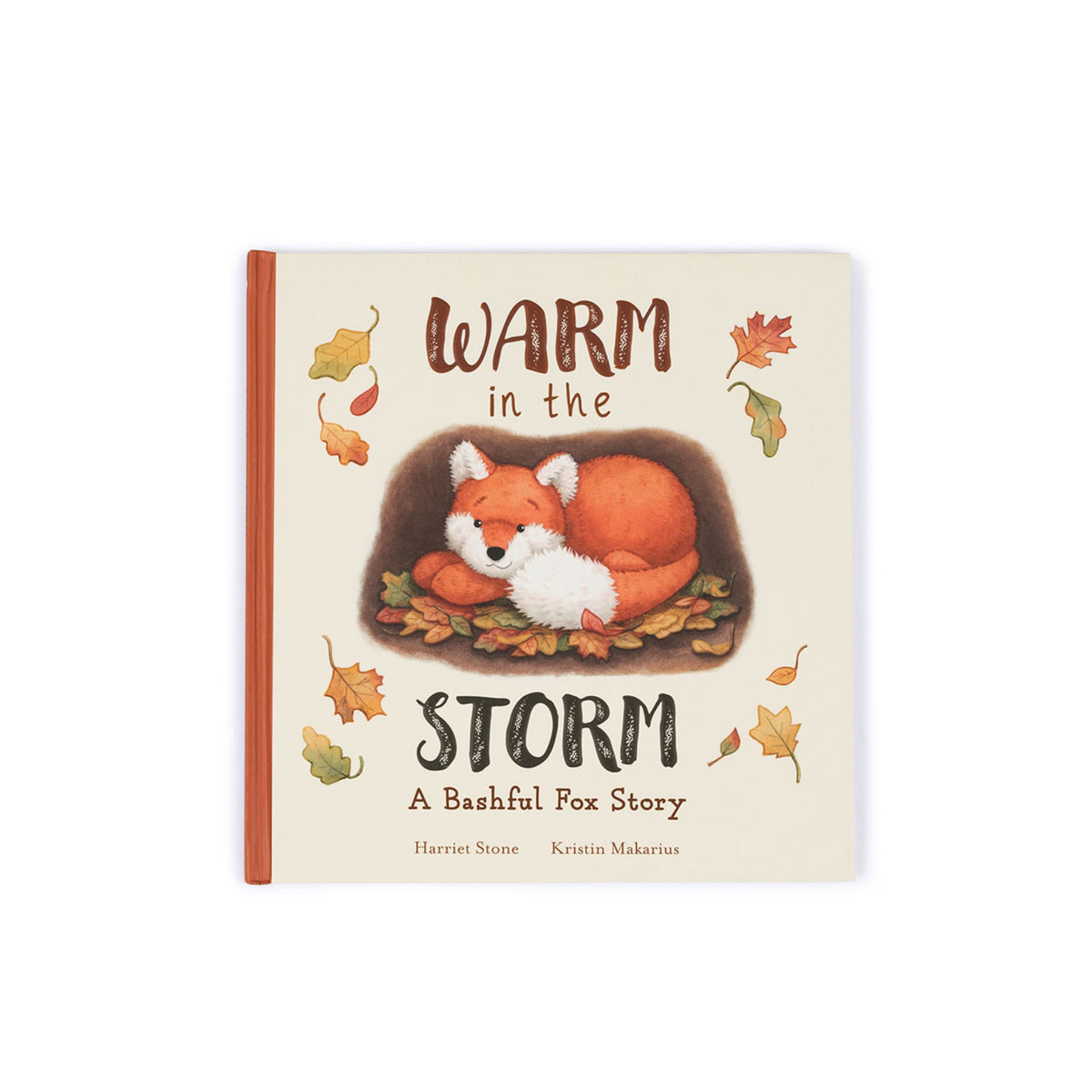 Book cover of 'Warm in the Storm: A Bashful Fox Story' with a fox illustration on a beige background.