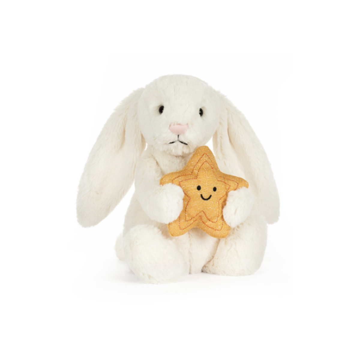 Plush white bunny holding a star-shaped cookie with a smiley face on a white background.
