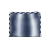 Dark blue and white checkered pouch on a white background.