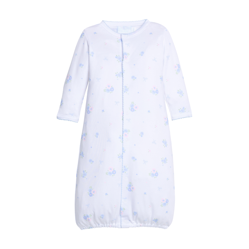 White baby converter gown with blue floral pattern on a white background.
