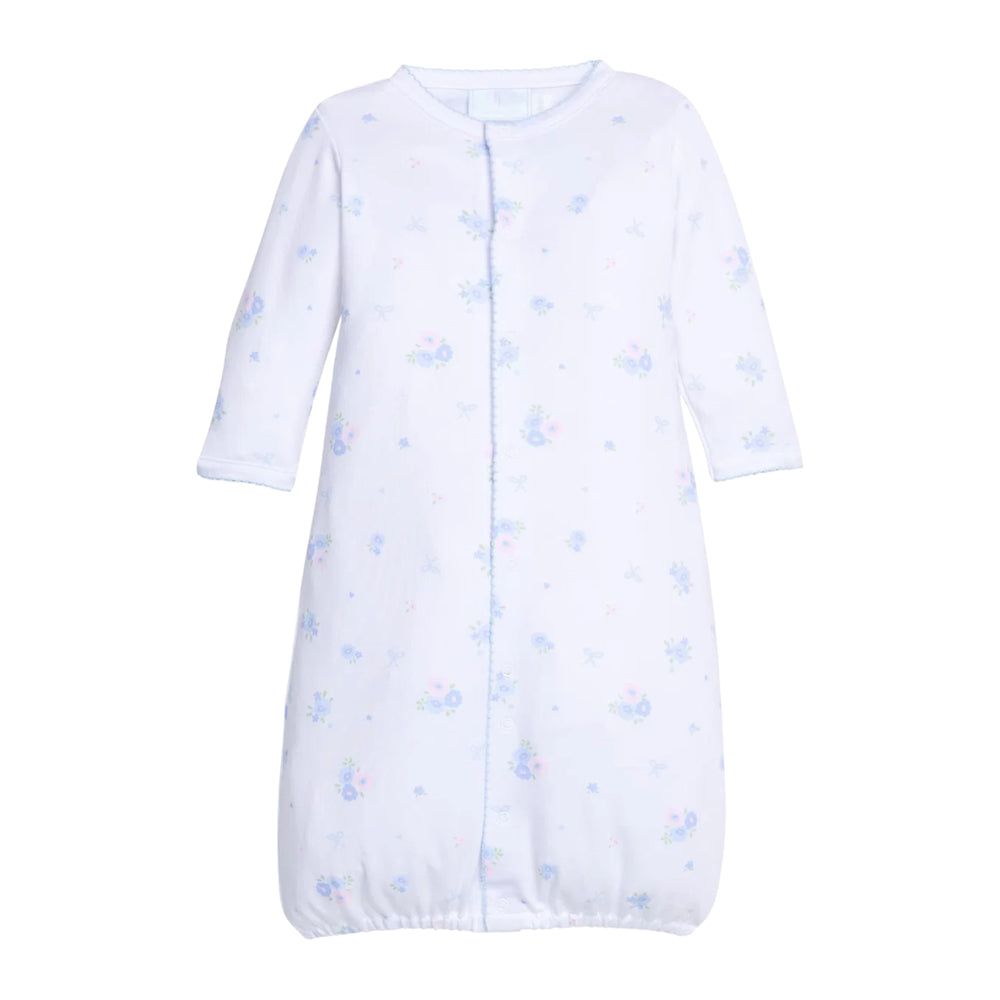 White baby converter gown with blue floral pattern on a white background.