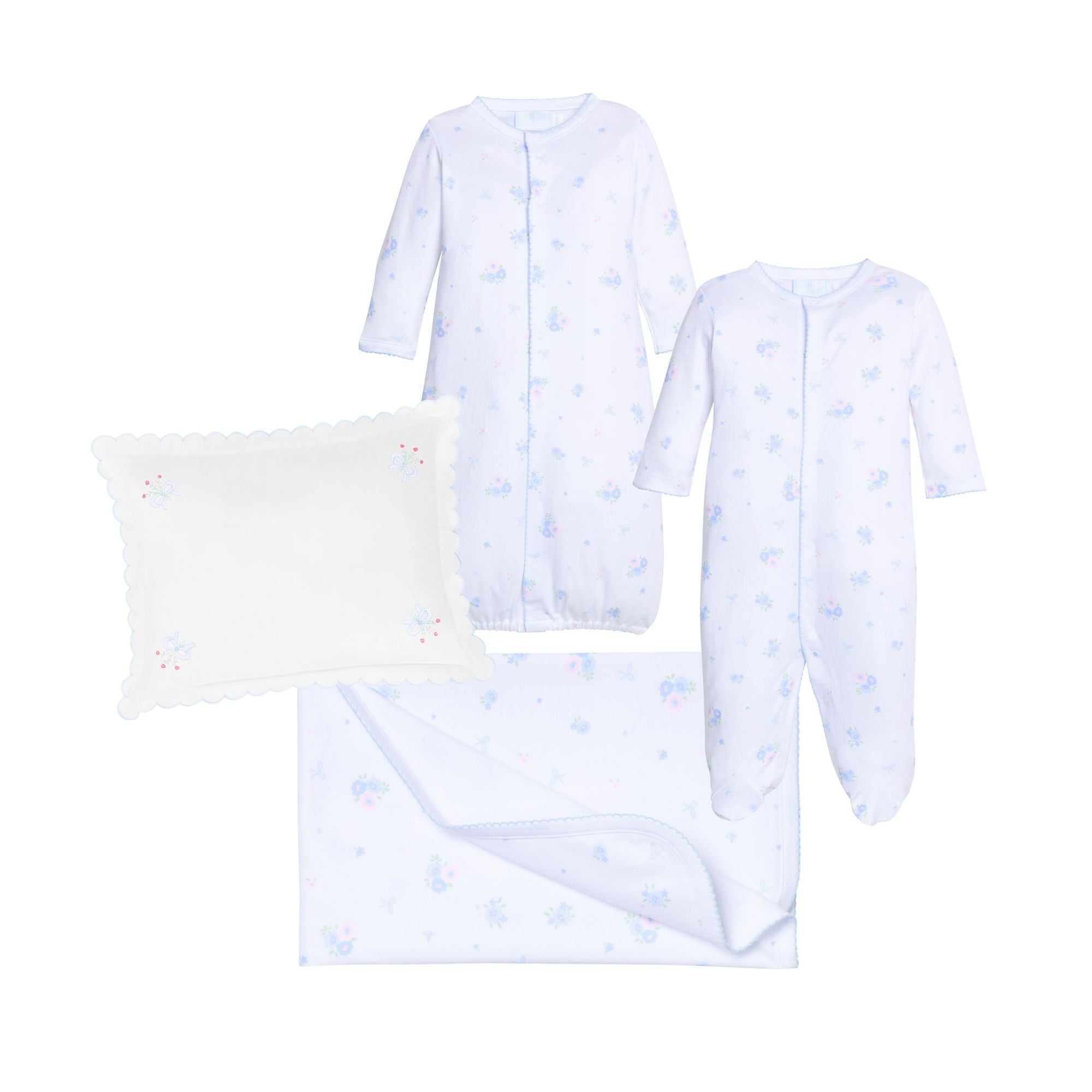 Collection of children's layette items including a converter gown, footie romper, receiving blanket and pillow case shown against a white background.
