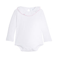 White long-sleeve baby bodysuit with pink trim on a white background.