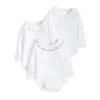 Three white long-sleeve baby bodysuits with ruffled collars, each featuring a different colored embroidered border (pink, red, and orange), arranged on a plain white background.