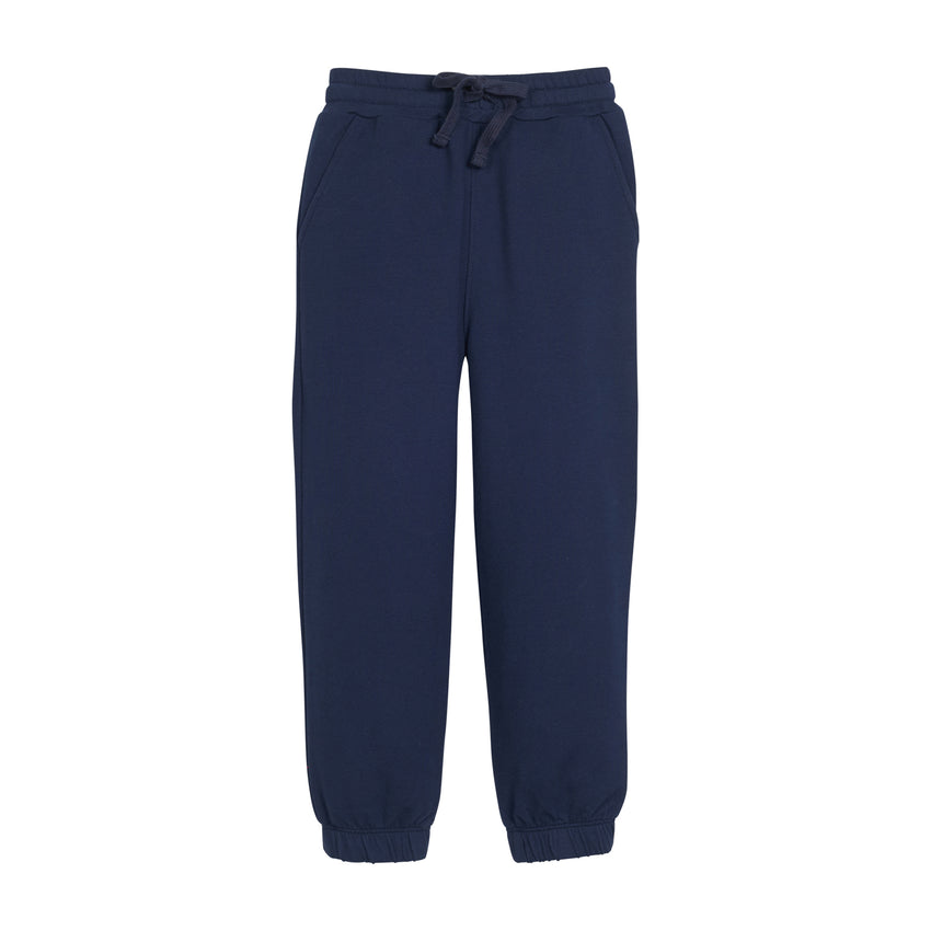Navy blue sweatpants with a drawstring on a white background.