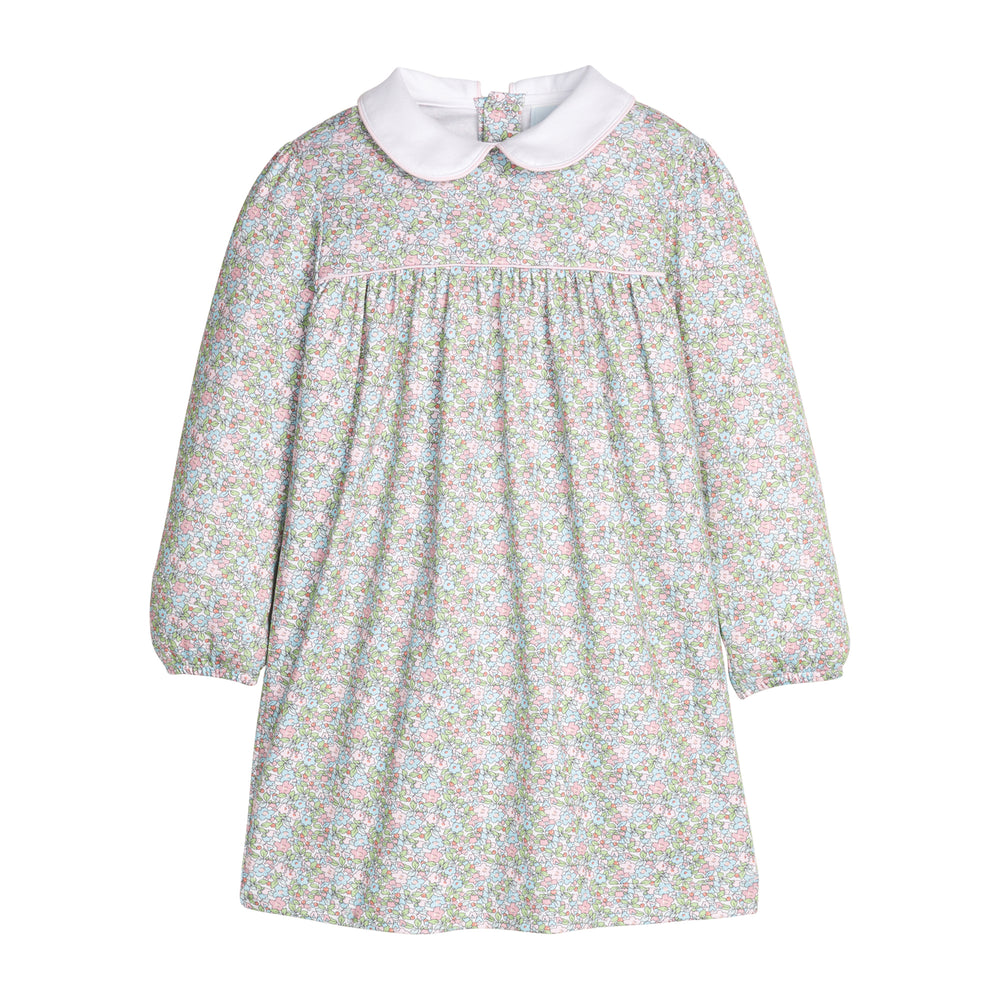 Green and pink floral dress with long sleeves, a white collar on a white background.