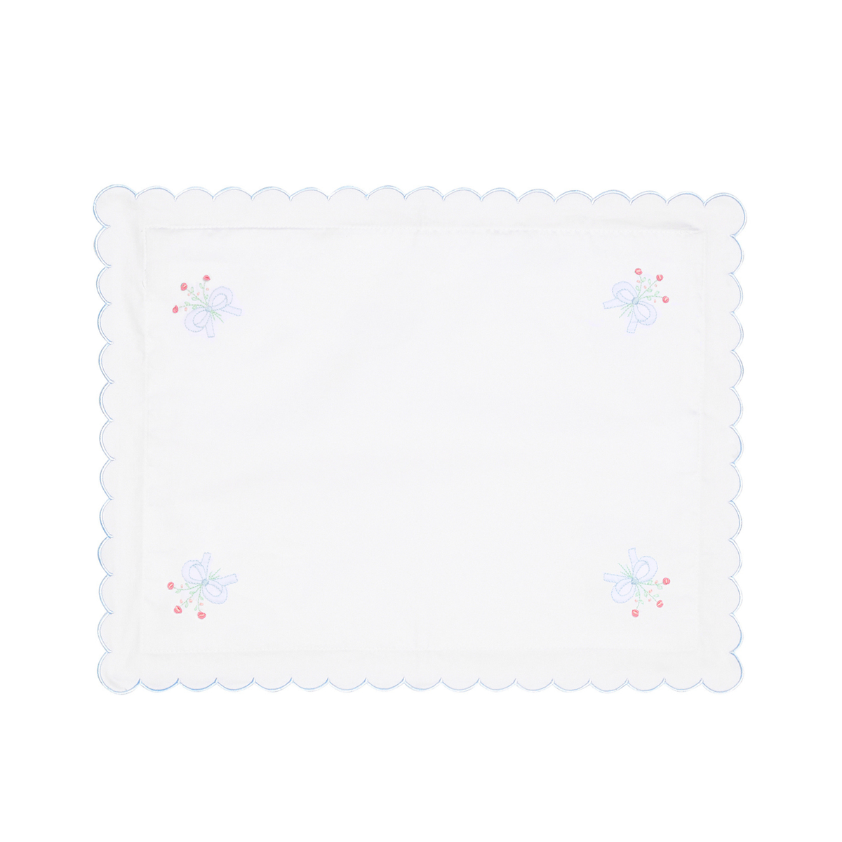 White pillow case with embroidered designs on a white background.
