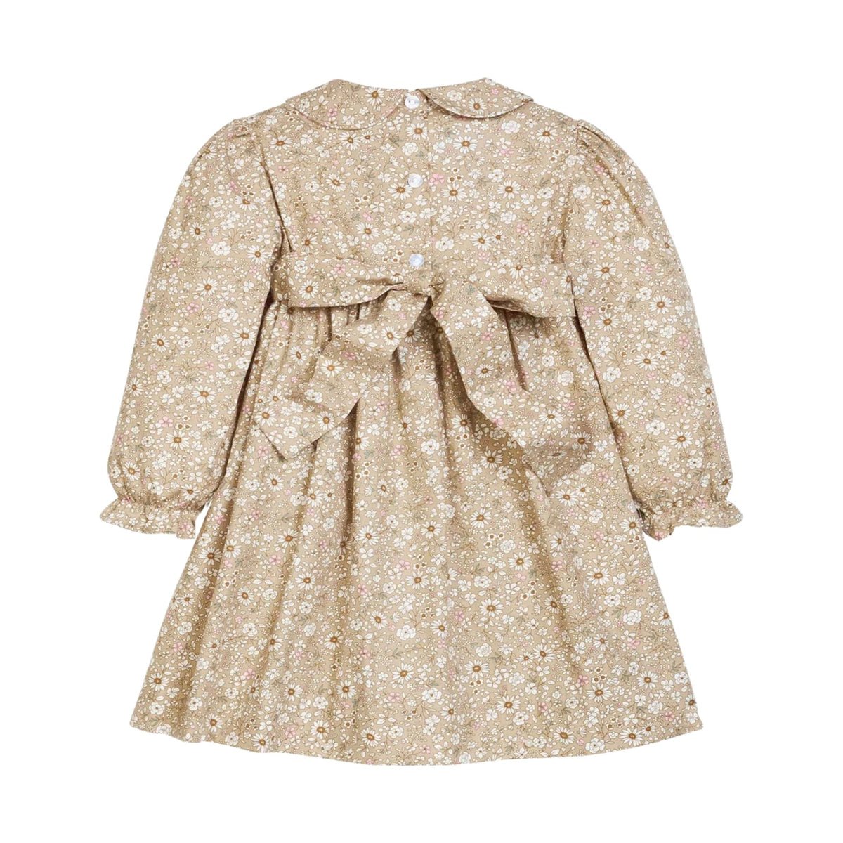 Back view of a  toddler girl's long-sleeve dress with a beige and white floral print, featuring a Peter Pan collar, puffed sleeves, and a matching fabric bow tied at the back waist.