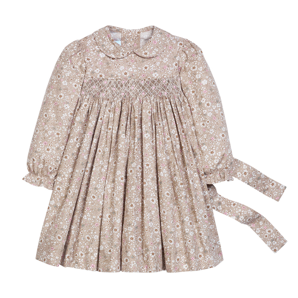 Floral dress with long sleeves on a white background. 