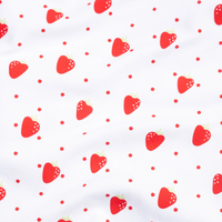 Pattern of red strawberries with green leaves on a white background.