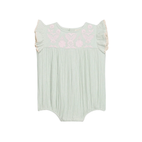 Light green baby romper with floral embroidery on a white background.
