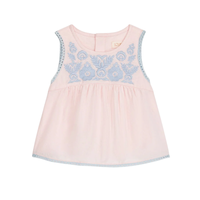 Pink top with blue floral embroidery on a white background.