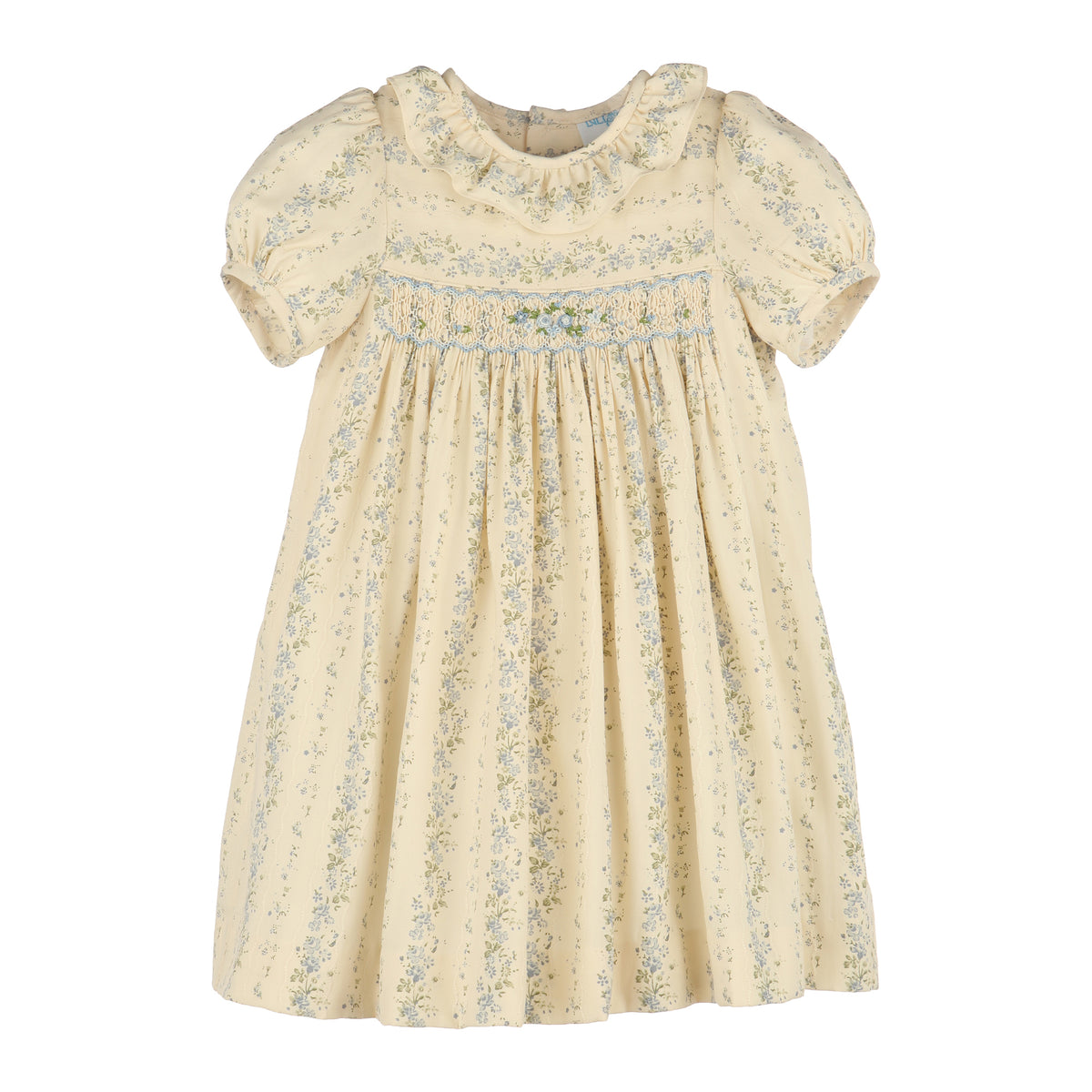 A cream-colored dress with a delicate blue and green floral print, featuring short puff sleeves, a ruffled collar, and smocked detailing across the chest.