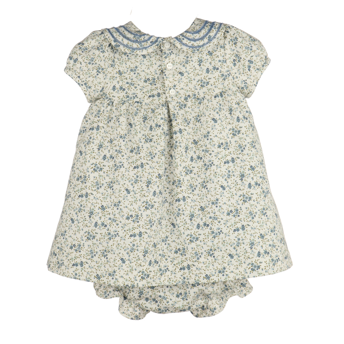 A girl's short-sleeve dress with a blue and green floral print on a cream background, featuring a Peter Pan collar with blue trim and a ruffled hem.