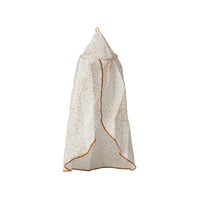 A white mini canopy baby bed with gold glittery star patterns and gold trim, suspended against a plain white background.