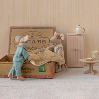 Mom and dad mouse making cigar box bed and other bedroom furniture.