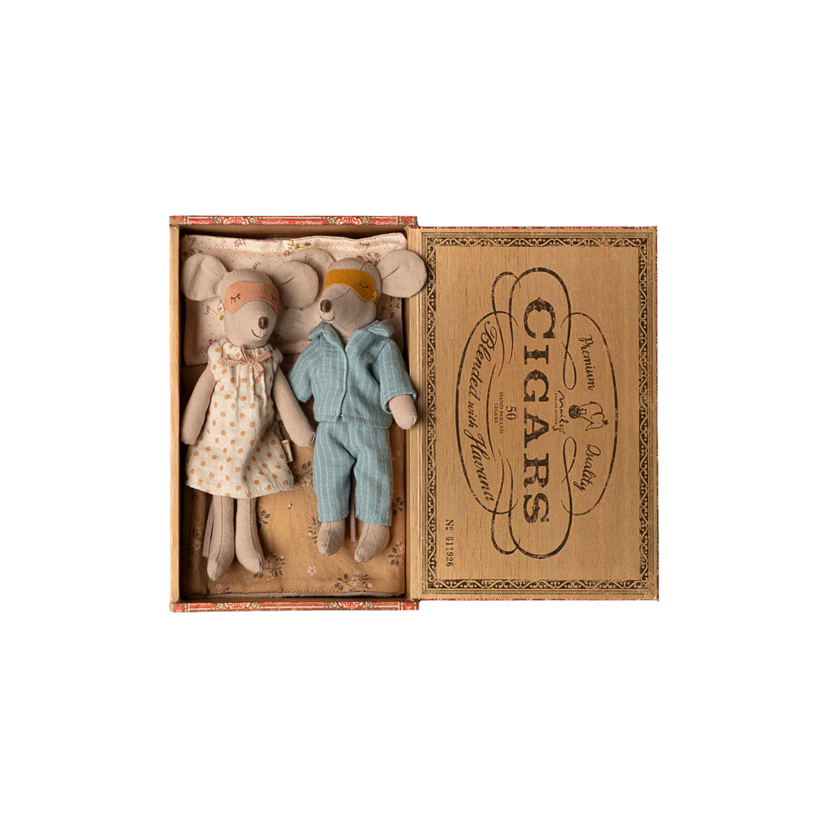 Mom and dad mice sleeping in a cigar box on a white background.