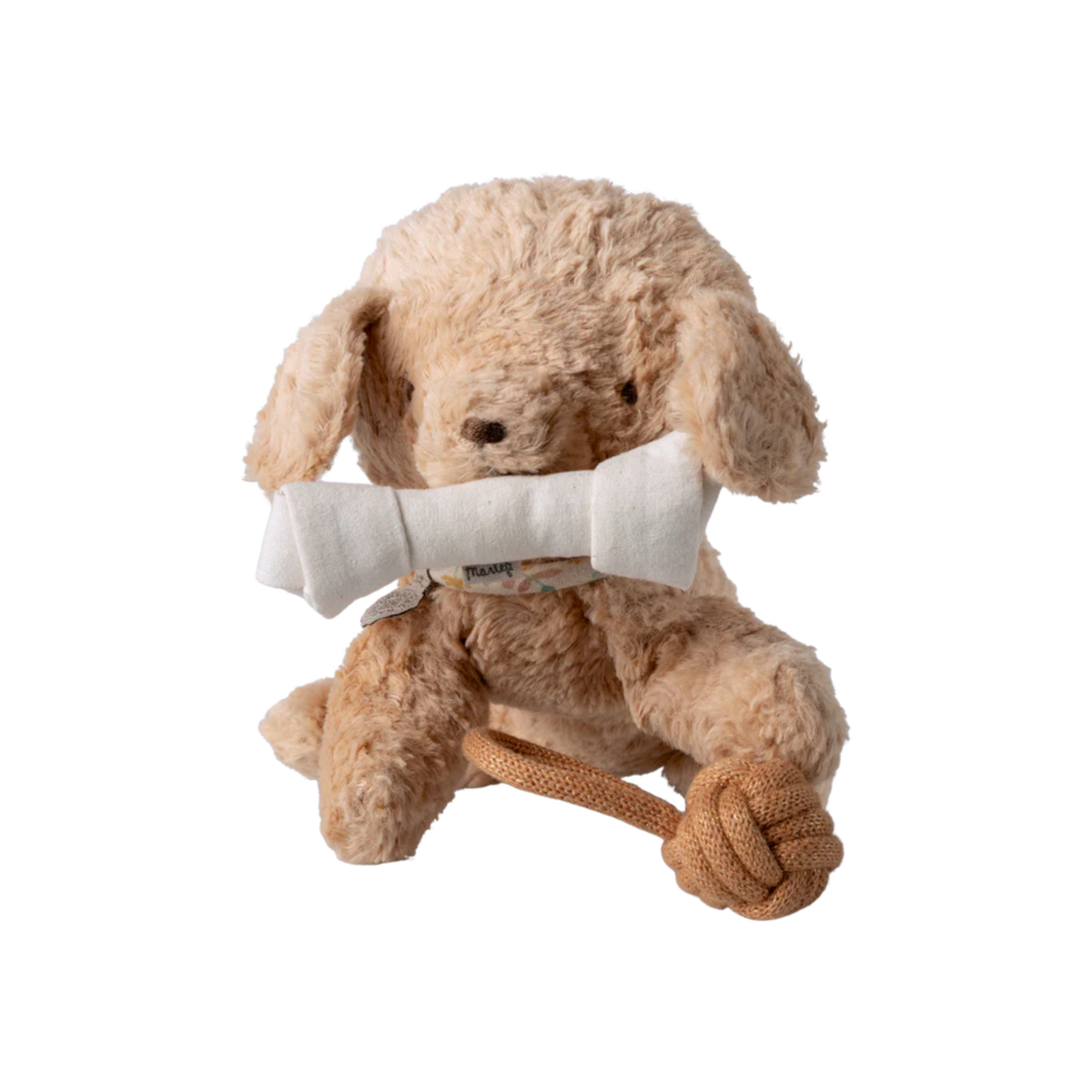 Plush dog toy with a bone on a white background.