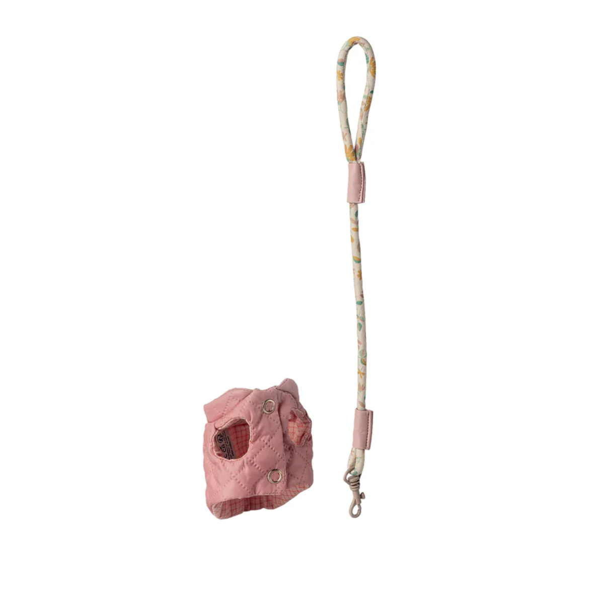 Pink textured toy pet harness with a leash on a white background.