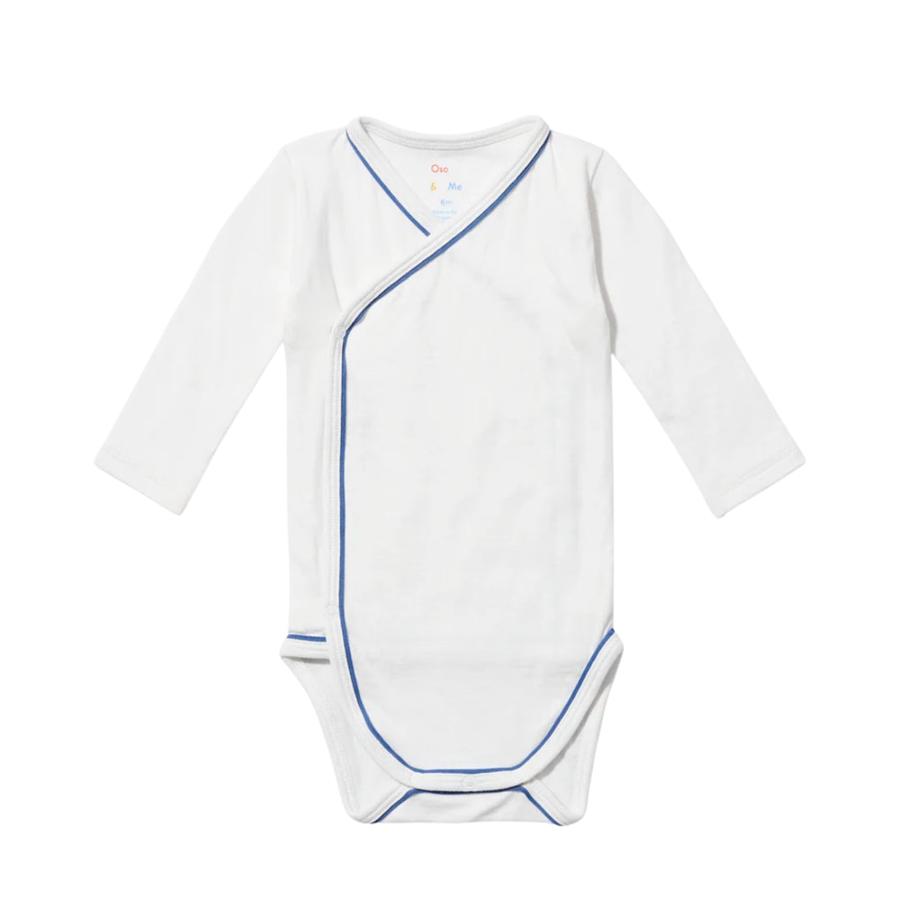 White crossbody one-piece with blue trim and  long sleeves on a white background.