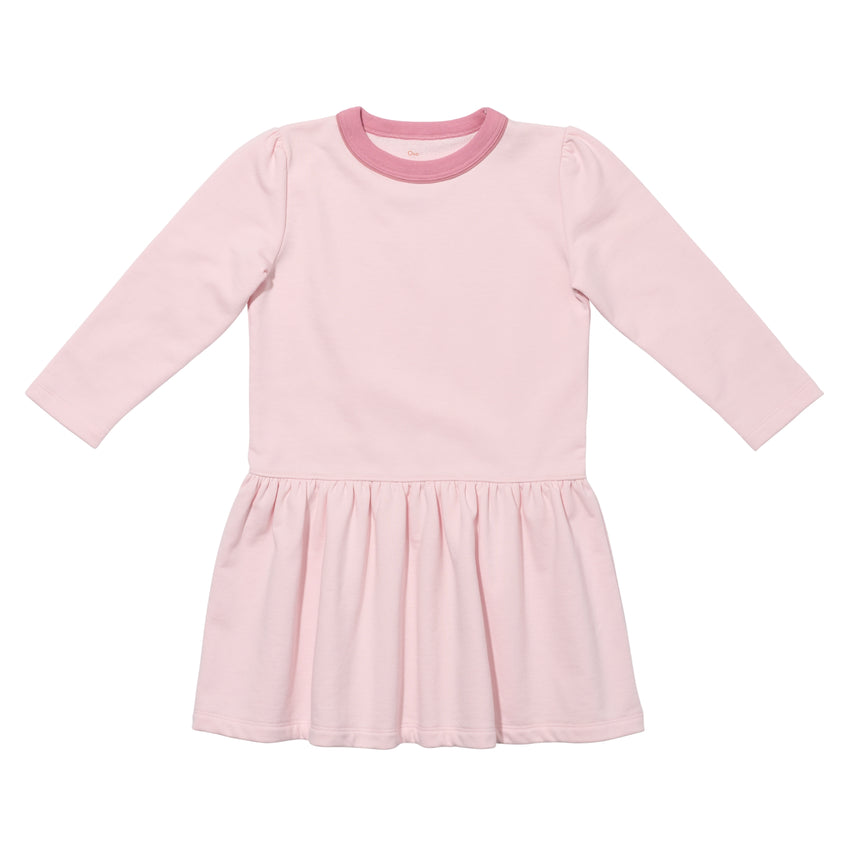 Pink dress with long sleeves on a white background.