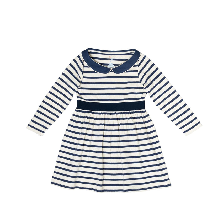 A long-sleeve baby dress with navy blue and white horizontal stripes, featuring a solid navy collar and waistband, displayed flat against a white background.
