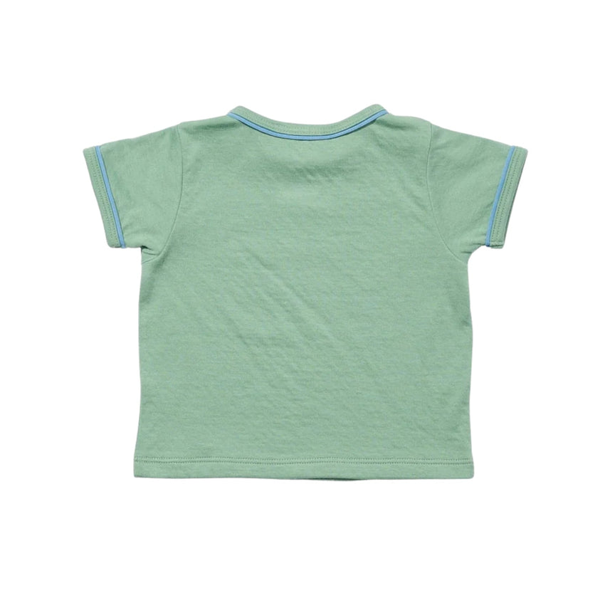 A light green short-sleeve t-shirt shown from the back, featuring thin blue piping along the collar and sleeve cuffs, set against a plain white background.